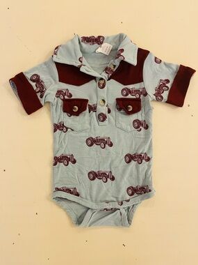Kate Quinn Tractor bodysuit